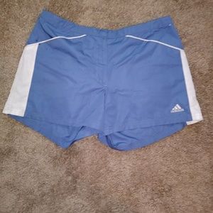 Blue and white adidas running shorts